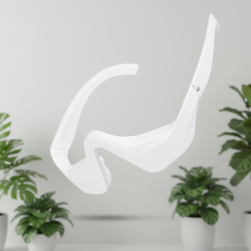 Modern white wall-mounted lamp with plants in the background